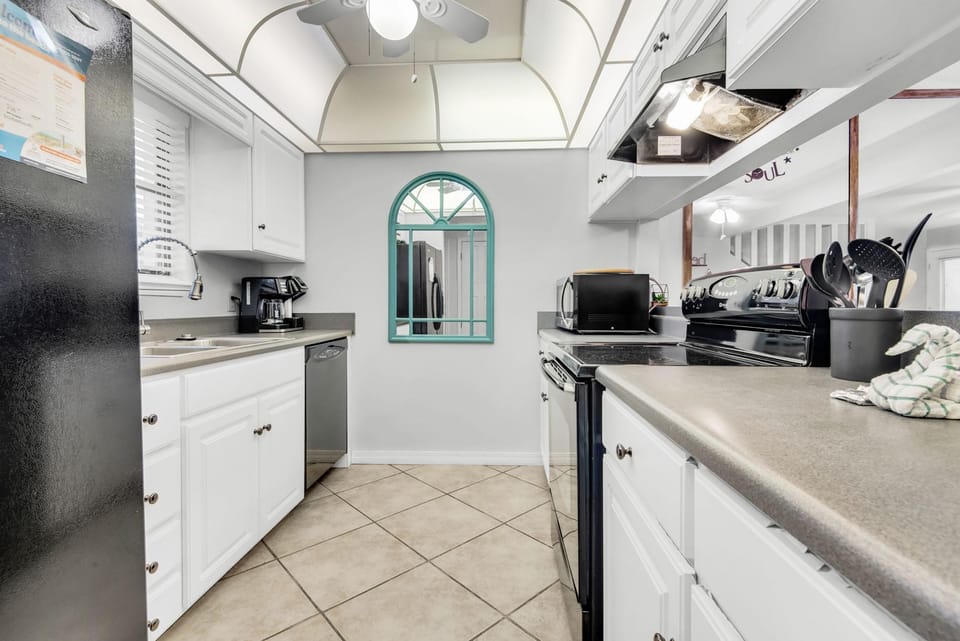 Condo, Multiple Beds (Sugar Beach F-26) | Private kitchen | Oven, toaster, paper towels