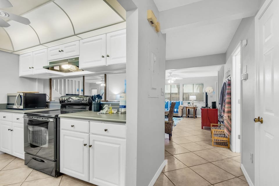 Condo, Multiple Beds (Sugar Beach F-26) | Private kitchen | Oven, toaster, paper towels