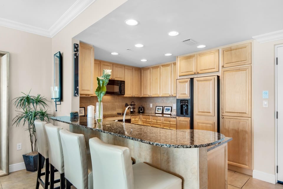 Condo, Multiple Beds (Portofino Island Resort 5-1002) | Private kitchen | Oven, toaster, paper towels