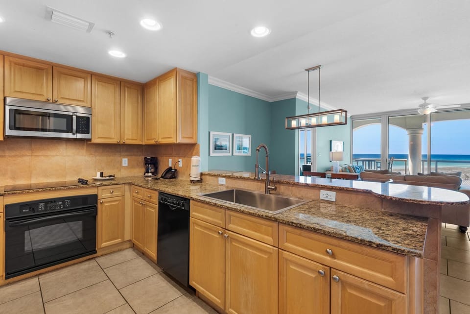 Condo, Multiple Beds (Portofino Island Resort 5-603) | Private kitchen | Oven, toaster, paper towels