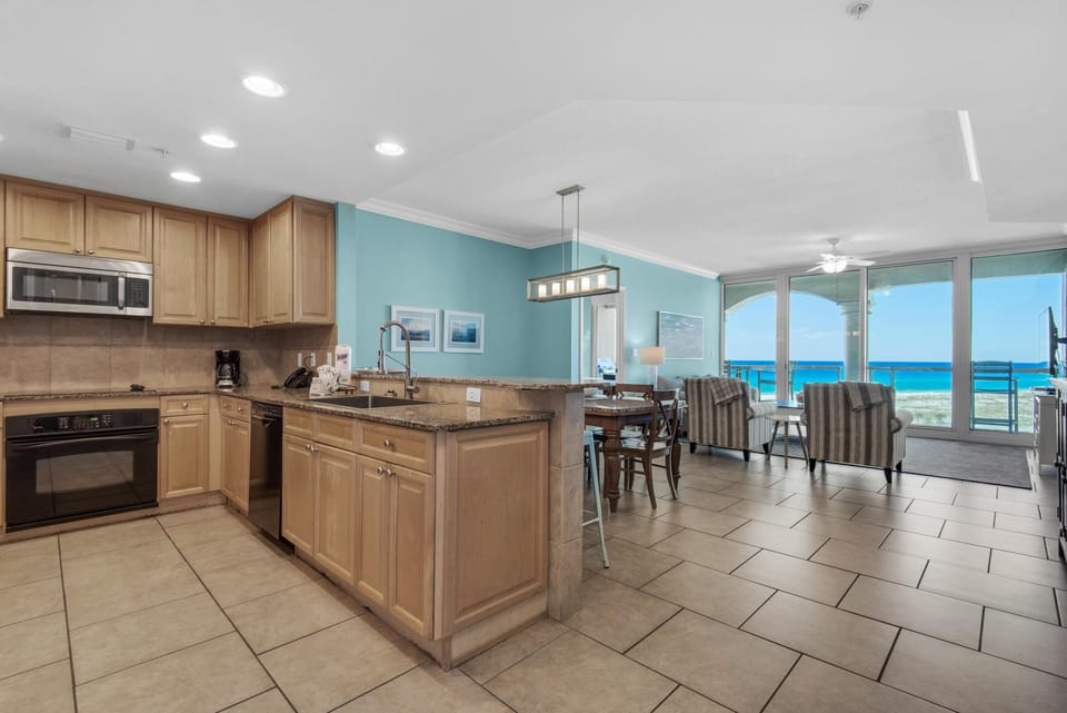 Condo, Multiple Beds (Portofino Island Resort 5-603) | Private kitchen | Oven, toaster, paper towels