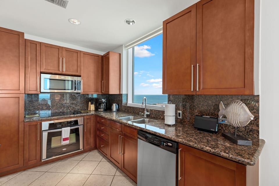 Tastefully decorated kitchen granite counter tops
