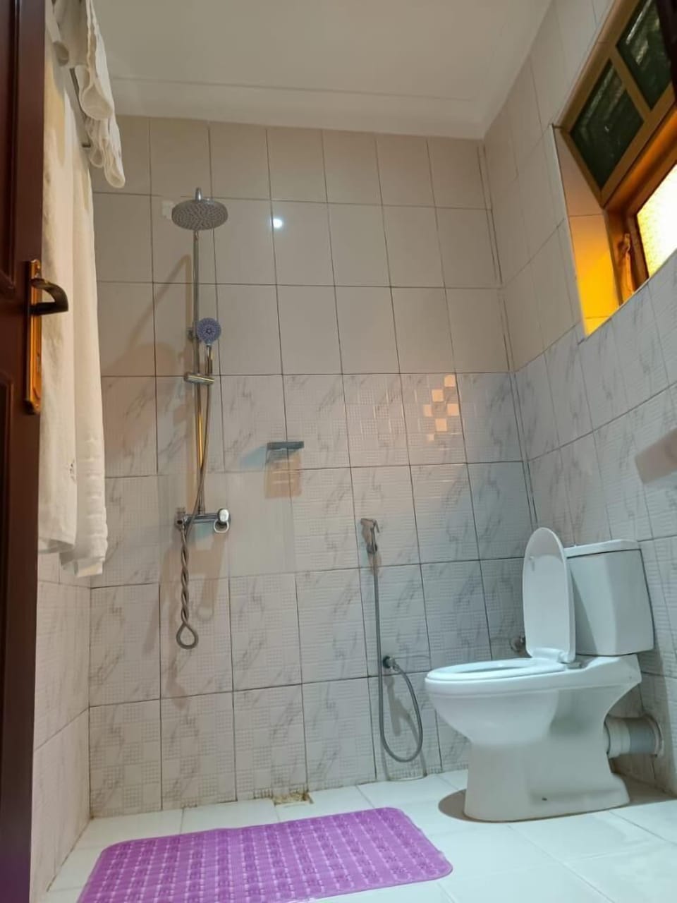 Slippers, towels, soap, toilet paper