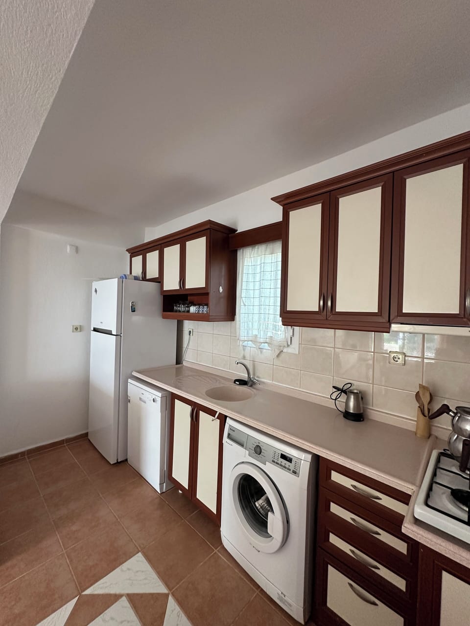 Basic Apartment | Private kitchen | Full-size fridge, stovetop, dishwasher, electric kettle