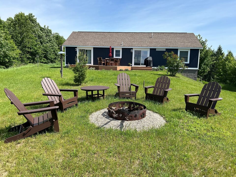 Outdoors - 3+ private acres, deck, outdoor chairs, gas grill, fire pit, corn hole.