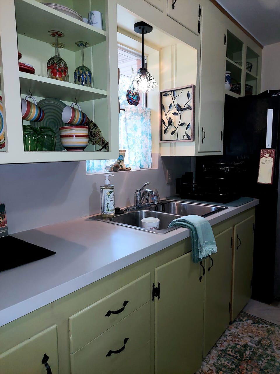 Fully stocked kitchen, has double deck  dish dryer, everything you need!