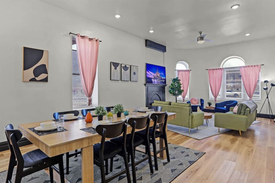Dedicated Workspace & Remote Work Nook: Stay productive during your stay with this dedicated workspace setup, featuring a spacious writing desk, task lighting, comfortable leather seating, and easy laptop connectivity perfect for remote work.