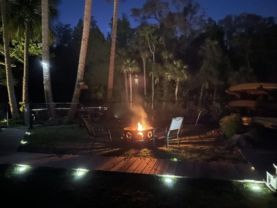 Enjoy the fire pit at night while hearing the fish jump in the river.