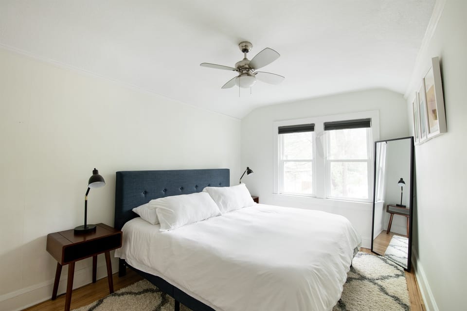 Upper bedroom with a luxurious king size bed that our guests rave about. Located just 5 steps up from the main floor.