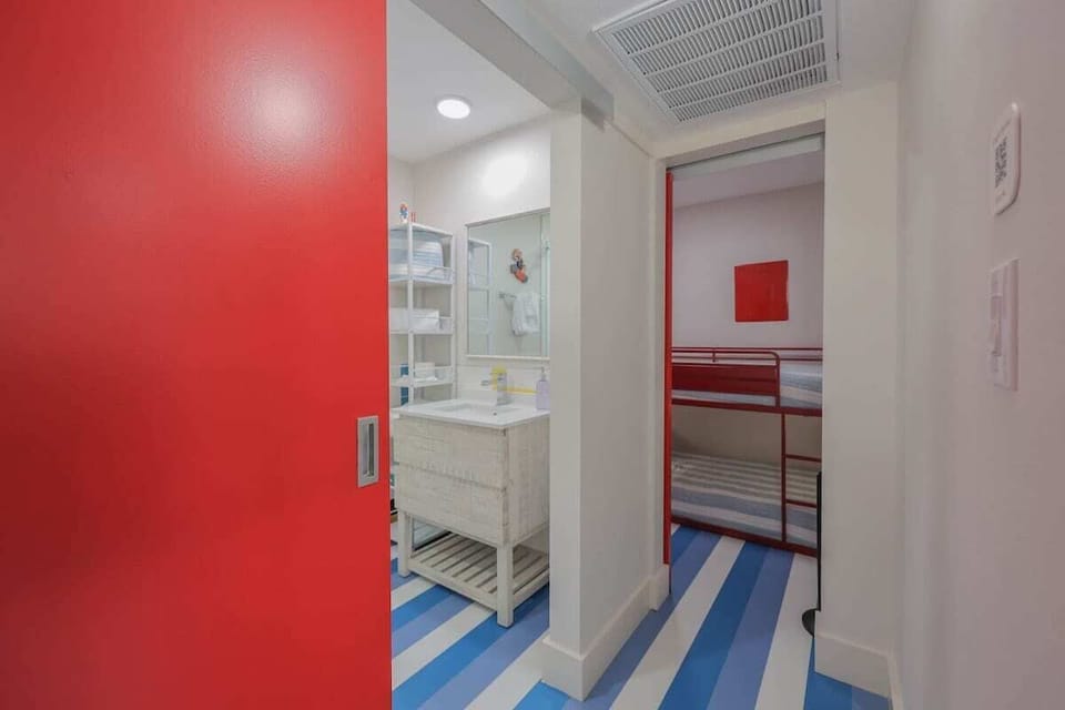 Cozy kids’ bunk room perfect for little ones, with a fun and comfortable setup for bedtime.