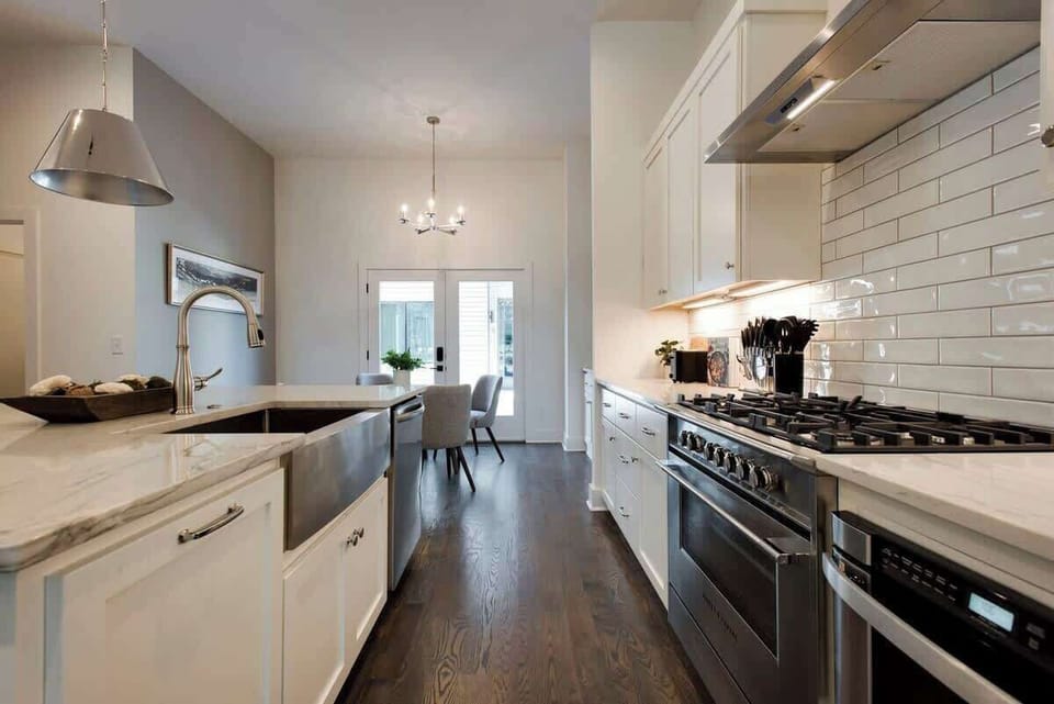 Bright and stylish kitchen with premium appliances, ample counter space, and everything needed for preparing meals at home.