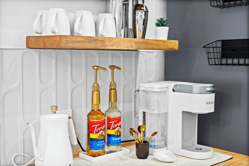 Coffee Bar: Keurig, French press, coffee grinder, kettle, Torani syrups, etc