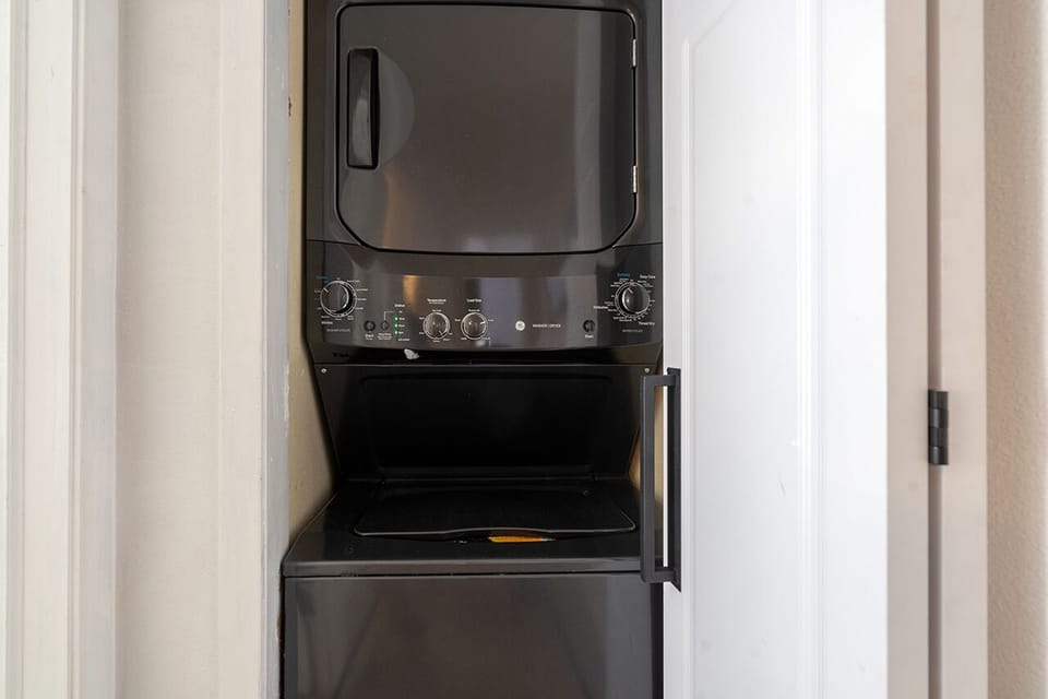 This unit features a stackable washer and dryer.