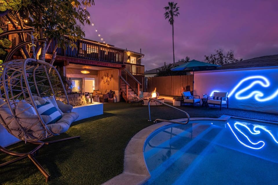Relax by the pool in this private, peaceful backyard.