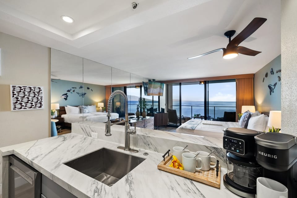Modern kitchen with high-end finishes and a functional layout that connects seamlessly to the living space