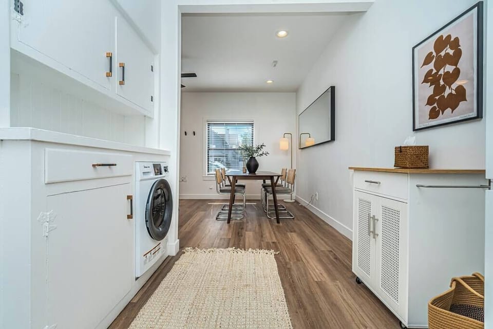 Convenience at every turn! Our cozy home features a handy washer dryer combo tucked away in the hallway, making laundry a breeze during your stay. Relax and enjoy the convenience of home away from home.