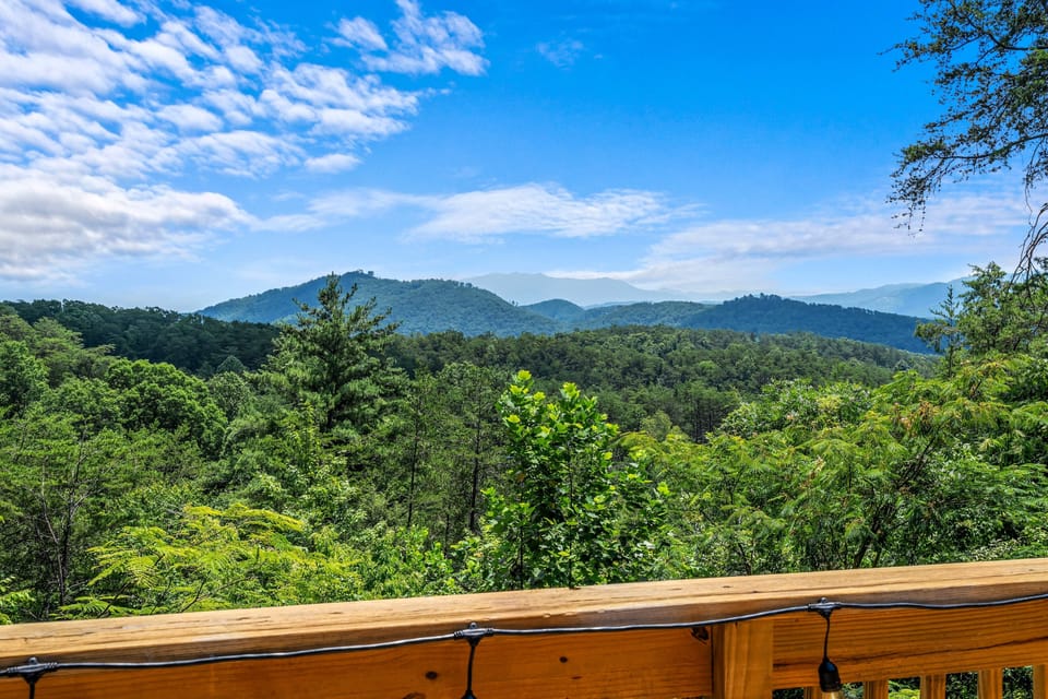 Elevate your senses with breathtaking mountains and a sea of vibrant greenery