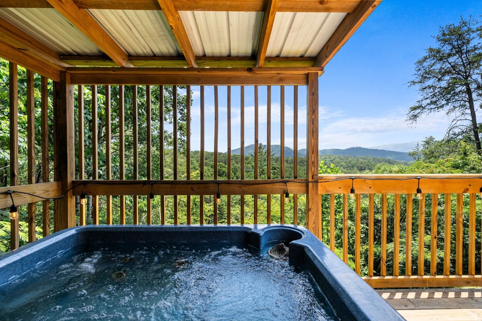 Soak in the views as you unwind in the spacious hot tub.