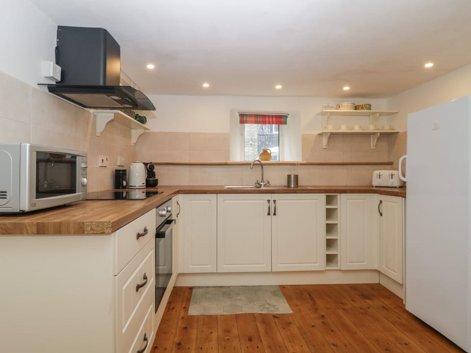 Fridge, toaster, cookware/dishes/utensils