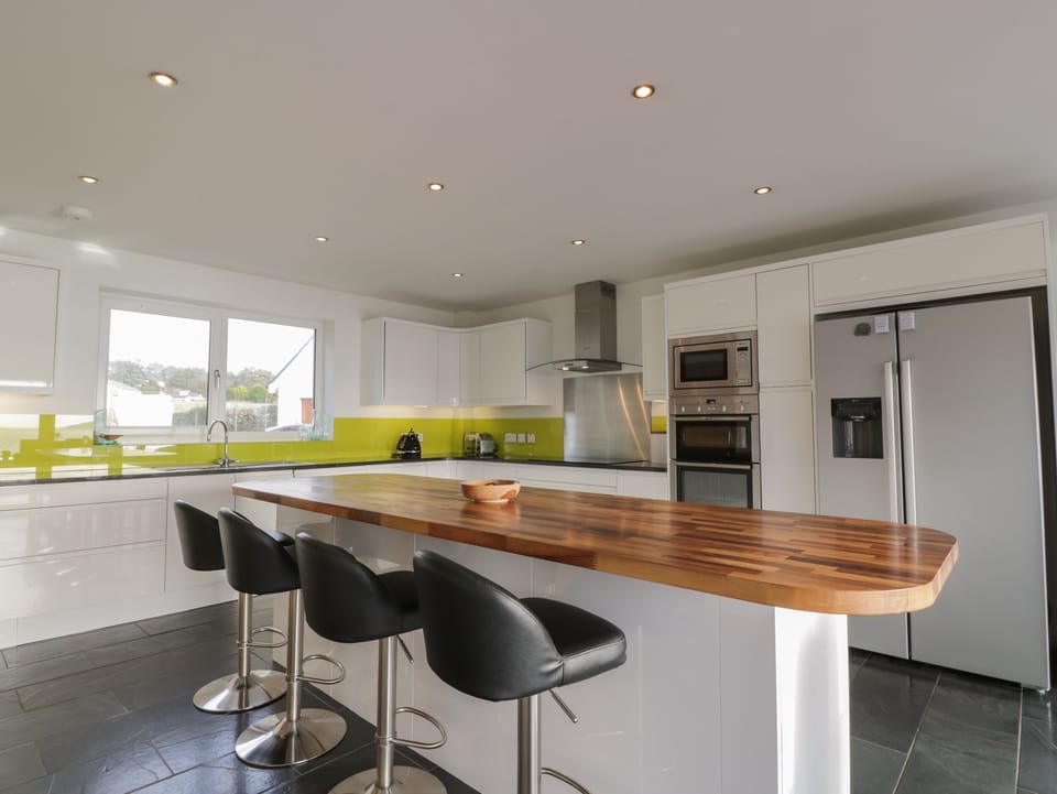 Fridge, electric kettle, toaster, cookware/dishes/utensils