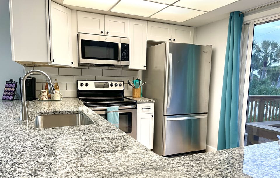 The kitchen itself is a vacation dream.  Fully stocked and ready for your meals.