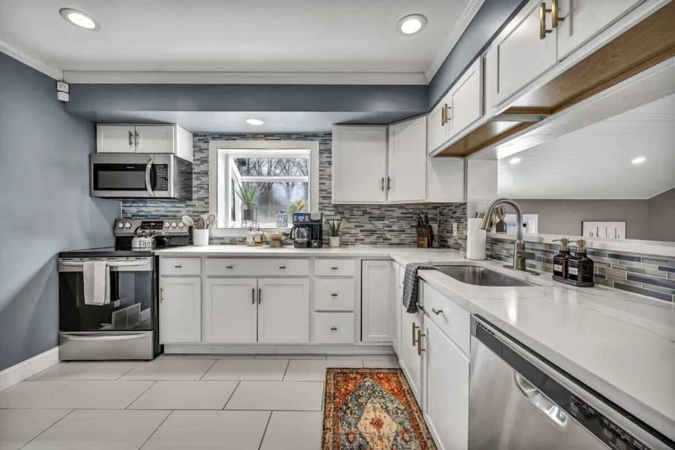 Culinary Haven: Unleash your inner chef in our fully-equipped kitchen with modern appliances, ample counter space, and a welcoming atmosphere.