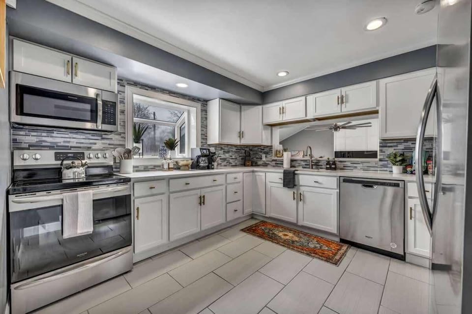 Spacious kitchen equipped with state-of-the-art appliances and ample counter space for culinary adventures.