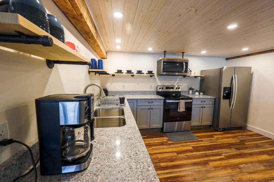 Exclusive Apartment | Private kitchen | Full-size fridge, microwave, oven, stovetop