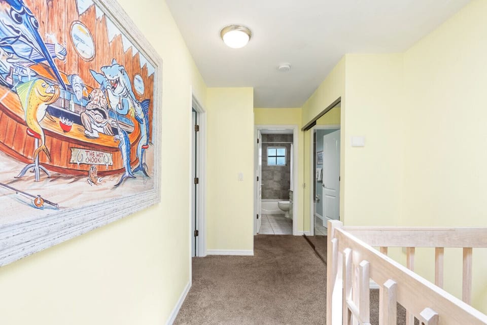 Upstairs hallway to guest bedrooms and bathroom