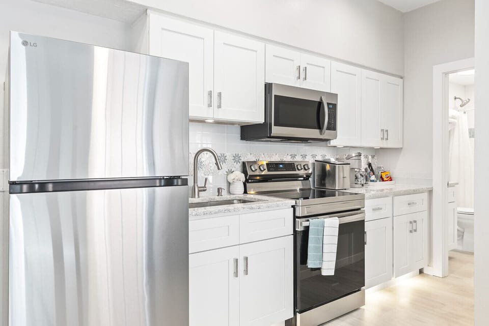 Dishware, cookware, glassware, & silverware provided