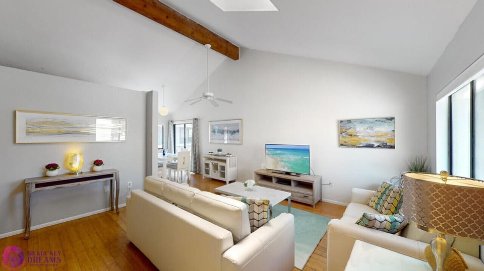 Living room with vaulted ceilings