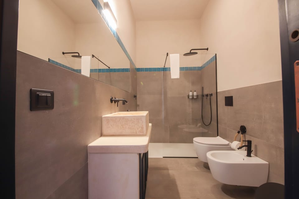 Junior Room, 1 Queen Bed with Sofa bed, Balcony, Garden View | Bathroom | Shower, hair dryer, bidet, towels