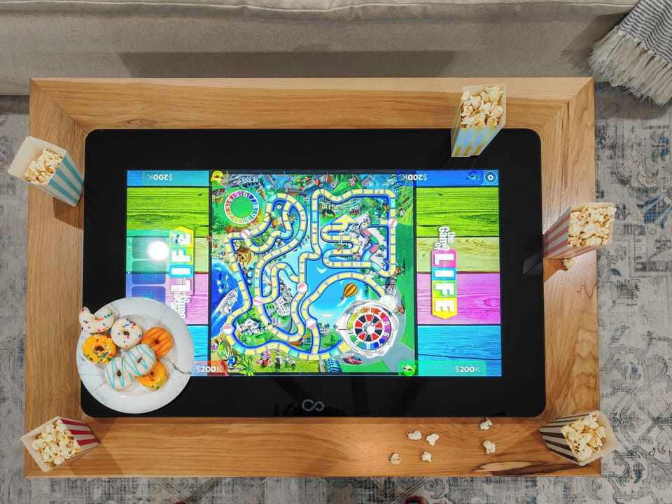 The Infinity Board brings immersive gaming to lively, laughter-filled evenings.