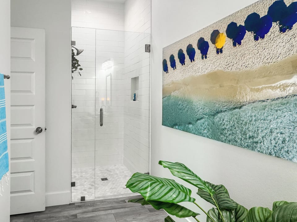 Private Bathroom #1 includes a single vanity and large walk-in shower.