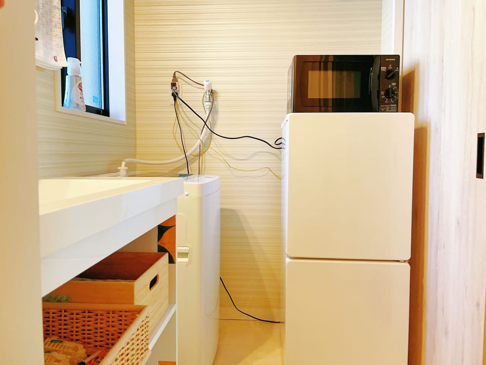 Romantic Triple Room | Bathroom | Combined shower/tub, free toiletries, hair dryer, bathrobes