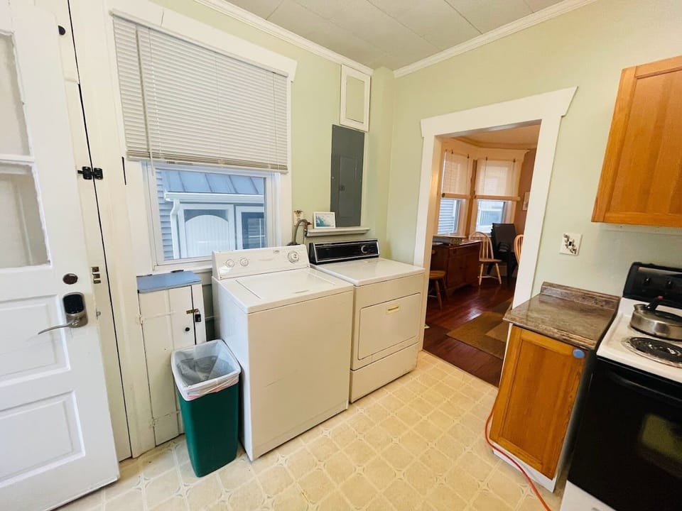 Kitchen with washer and dryer