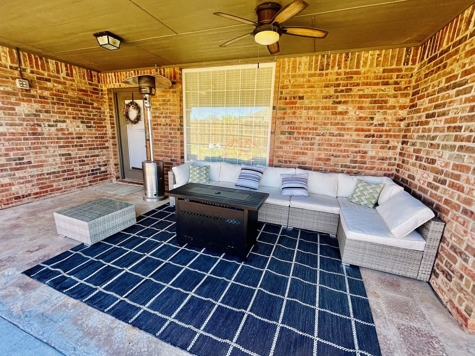 Private outdoor patio with fireplace