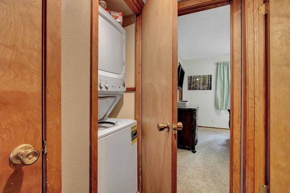Washer and Dryer stack unit in the condo