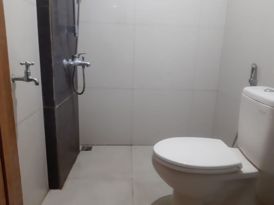Standard Double Room | Bathroom | Shower, towels, soap