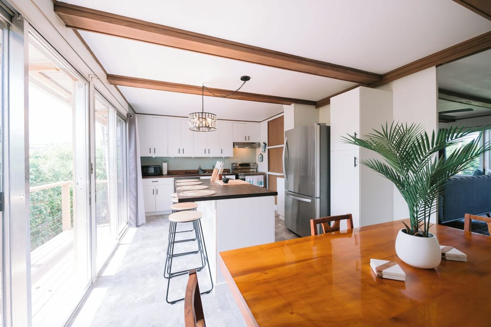 Ample seating for the whole gang at the island and the dining table
