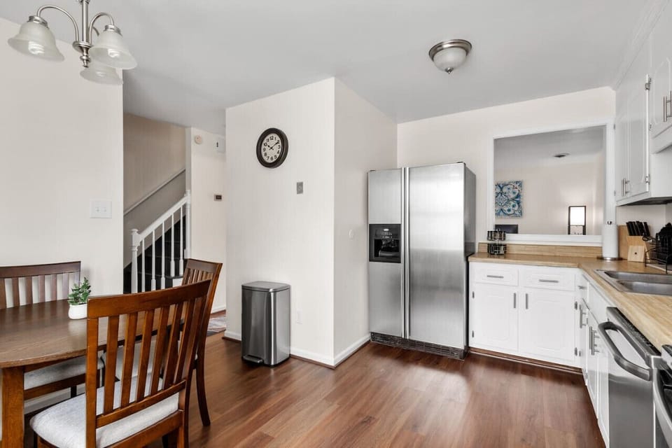 We have a fully equipped kitchen featuring a microwave, dishwasher, stove, oven, Keurig coffee maker, and more. It`s conveniently adjacent to the dining area, which comfortably seats four people.