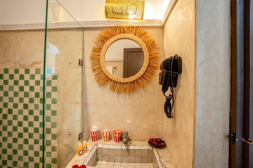 Shower, free toiletries, hair dryer, towels
