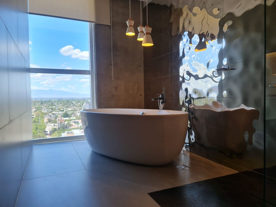 Presidential Suite | Bathroom | Rainfall showerhead, hair dryer, bidet, towels
