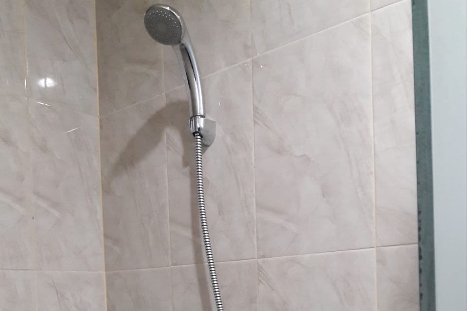 Deluxe Double Room | Bathroom | Shower, towels, soap
