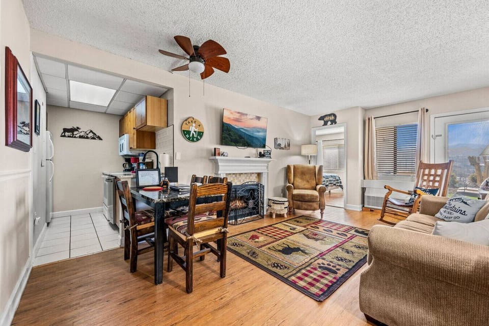 The dining table is located just off the kitchen and offers additional seating.