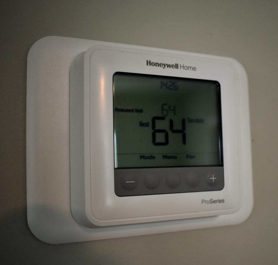 Digital thermostat to keep you warm in Winter and cool in Summer.
