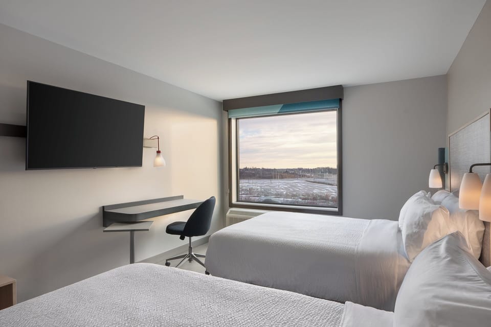 Pillowtop beds, desk, laptop workspace, blackout drapes