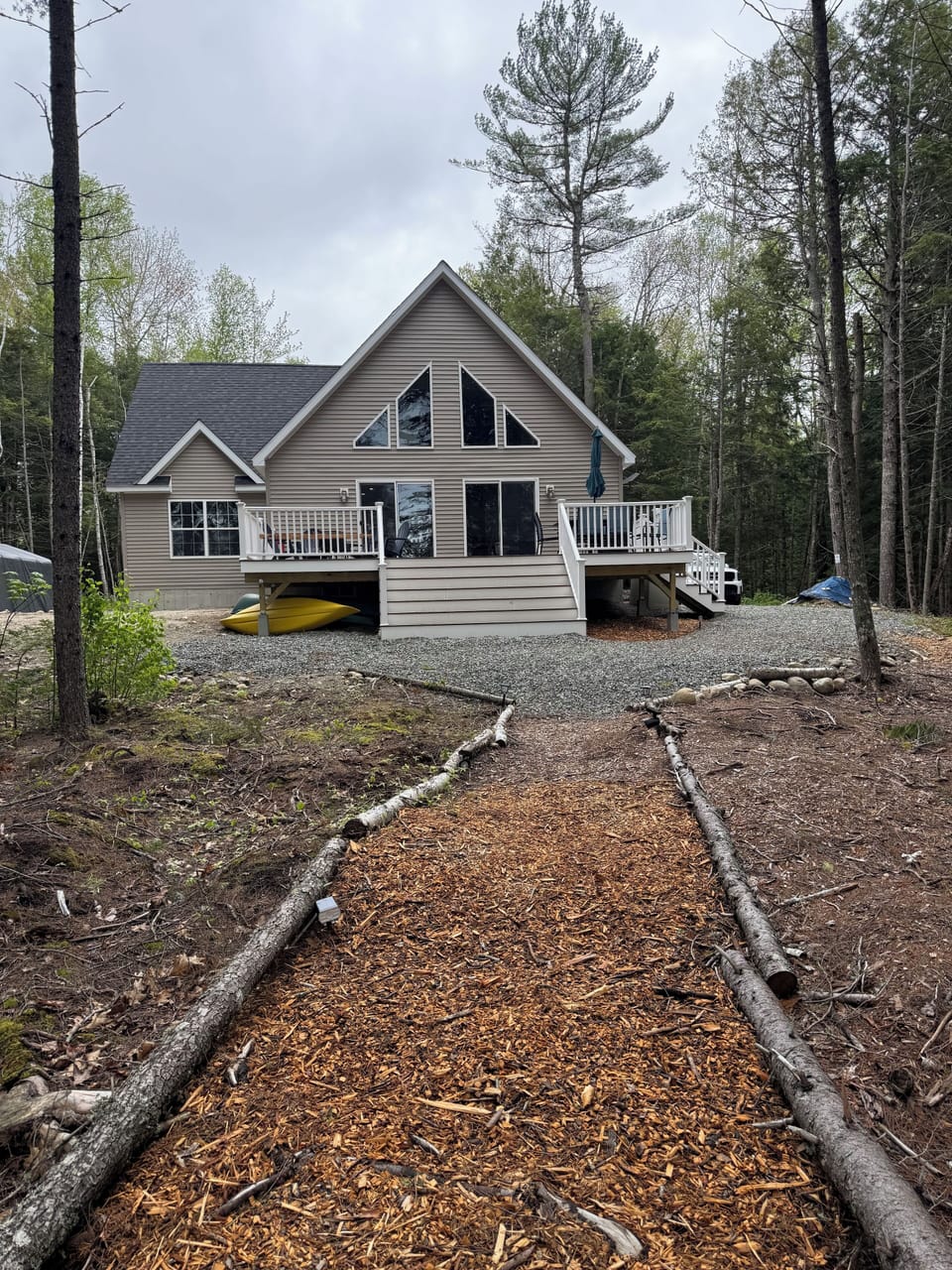 Deck with Solostove, Grill, and Outdoor Dining Table with Umbrella