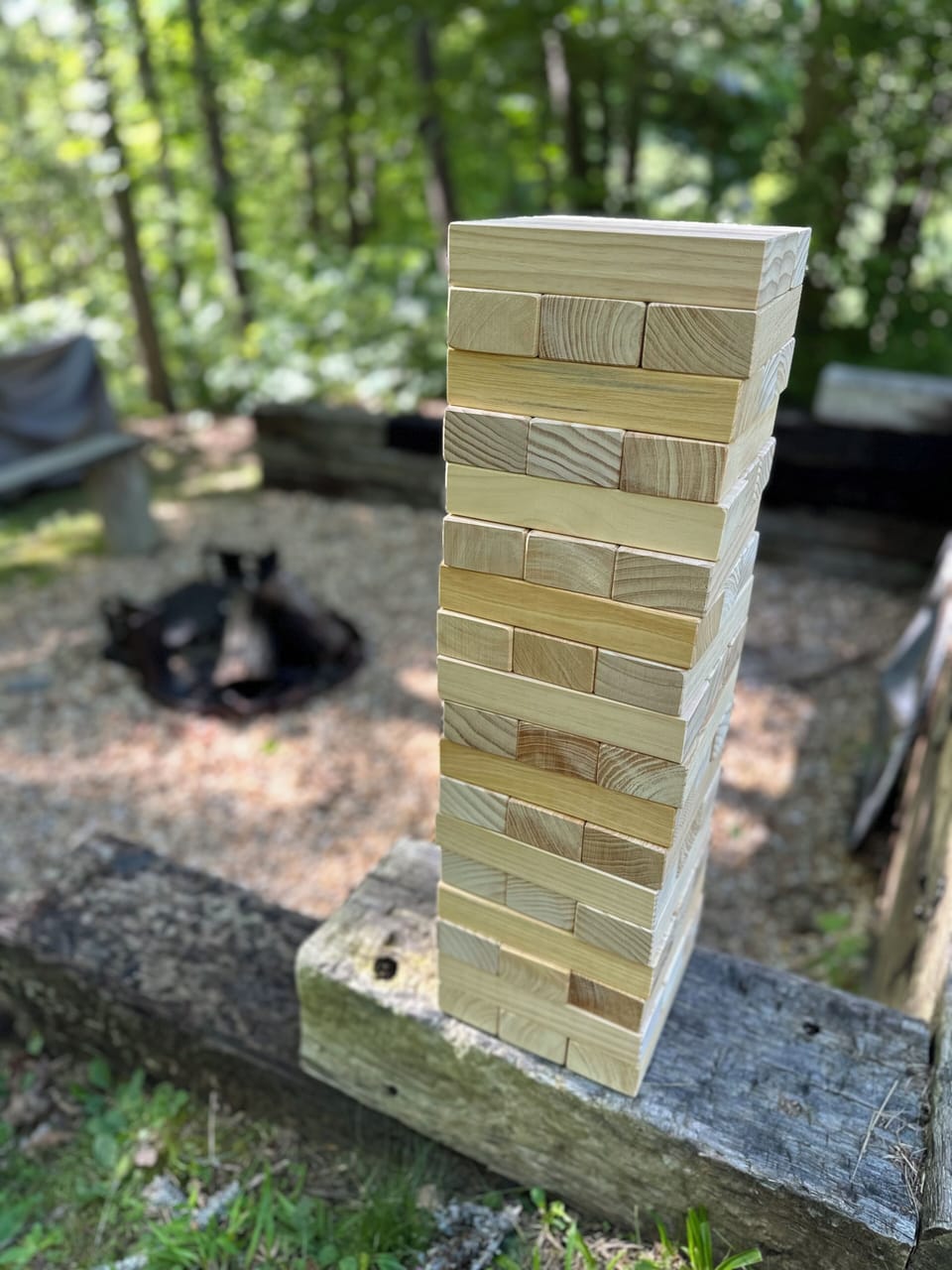 Giant Jenga game for outdoor fun and friendly competition.