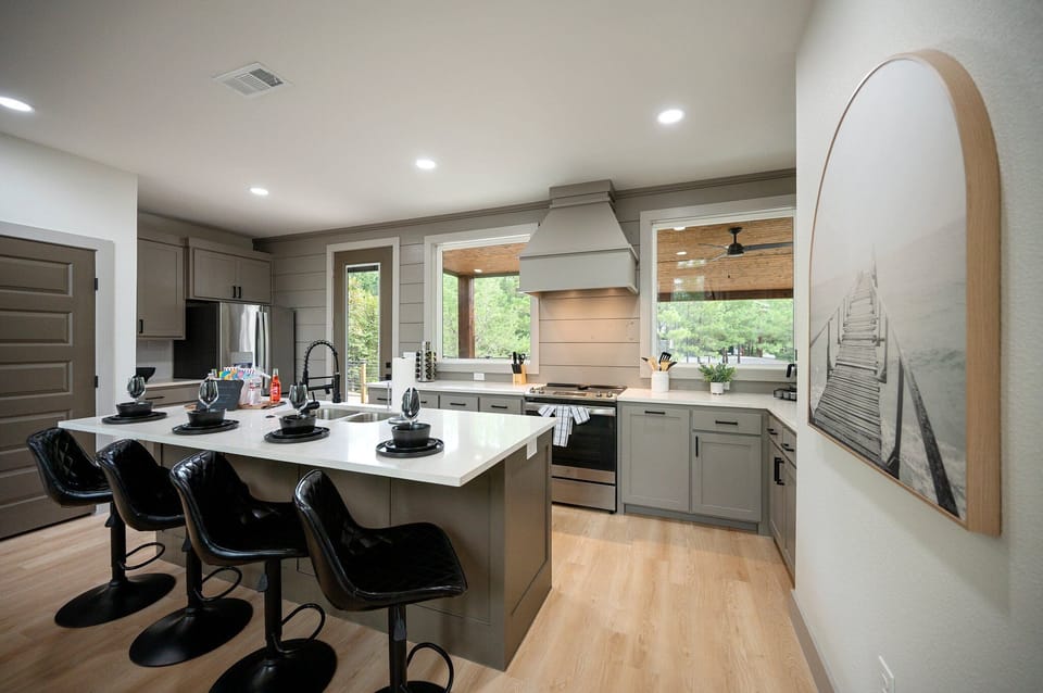 Stylish modern kitchen with a spacious island and cozy, inviting ambiance!